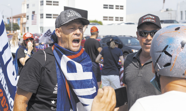 Rally Turns Violent as Extremist Groups Take Part