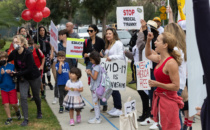 Protesters Oppose Vaccine  Mandates at Walk to School Day
