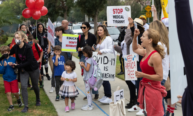 Protesters Oppose Vaccine  Mandates at Walk to School Day