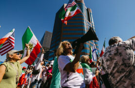 Rally attendees celebrate the US attack on Iran
