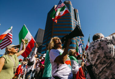Rally attendees celebrate the US attack on Iran