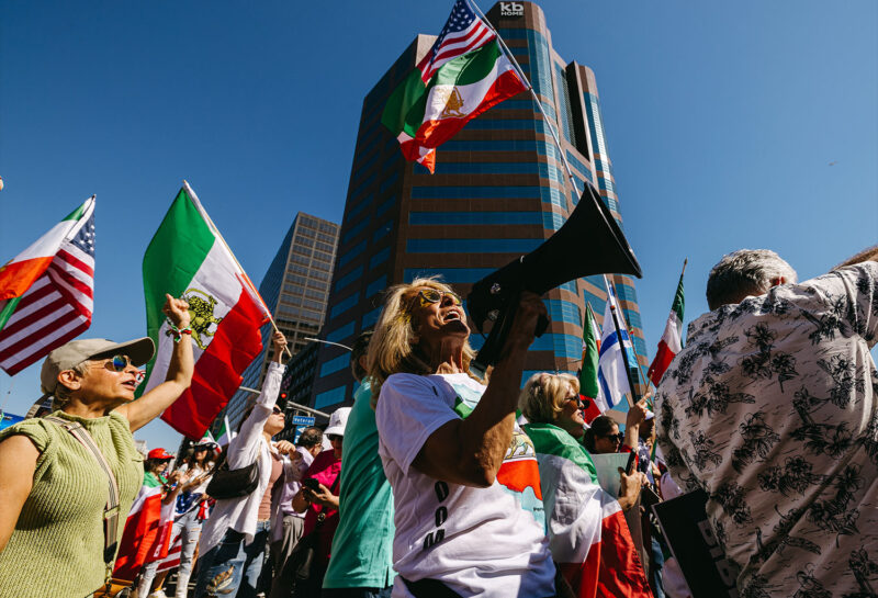 Rally attendees celebrate the US attack on Iran