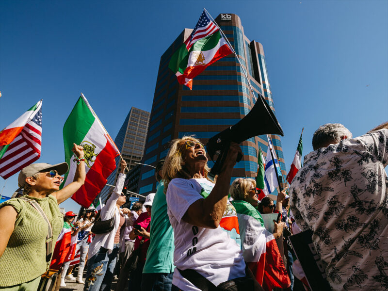 Rally attendees celebrate the US attack on Iran