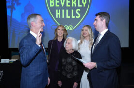 Craig Corman was sworn in as mayor surrounded by his family.