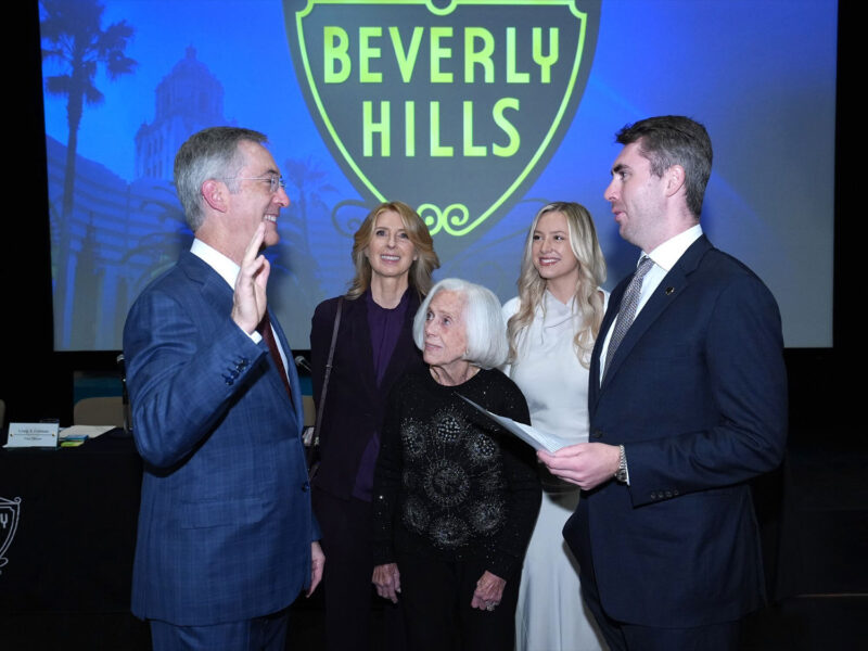 Craig Corman was sworn in as mayor surrounded by his family.