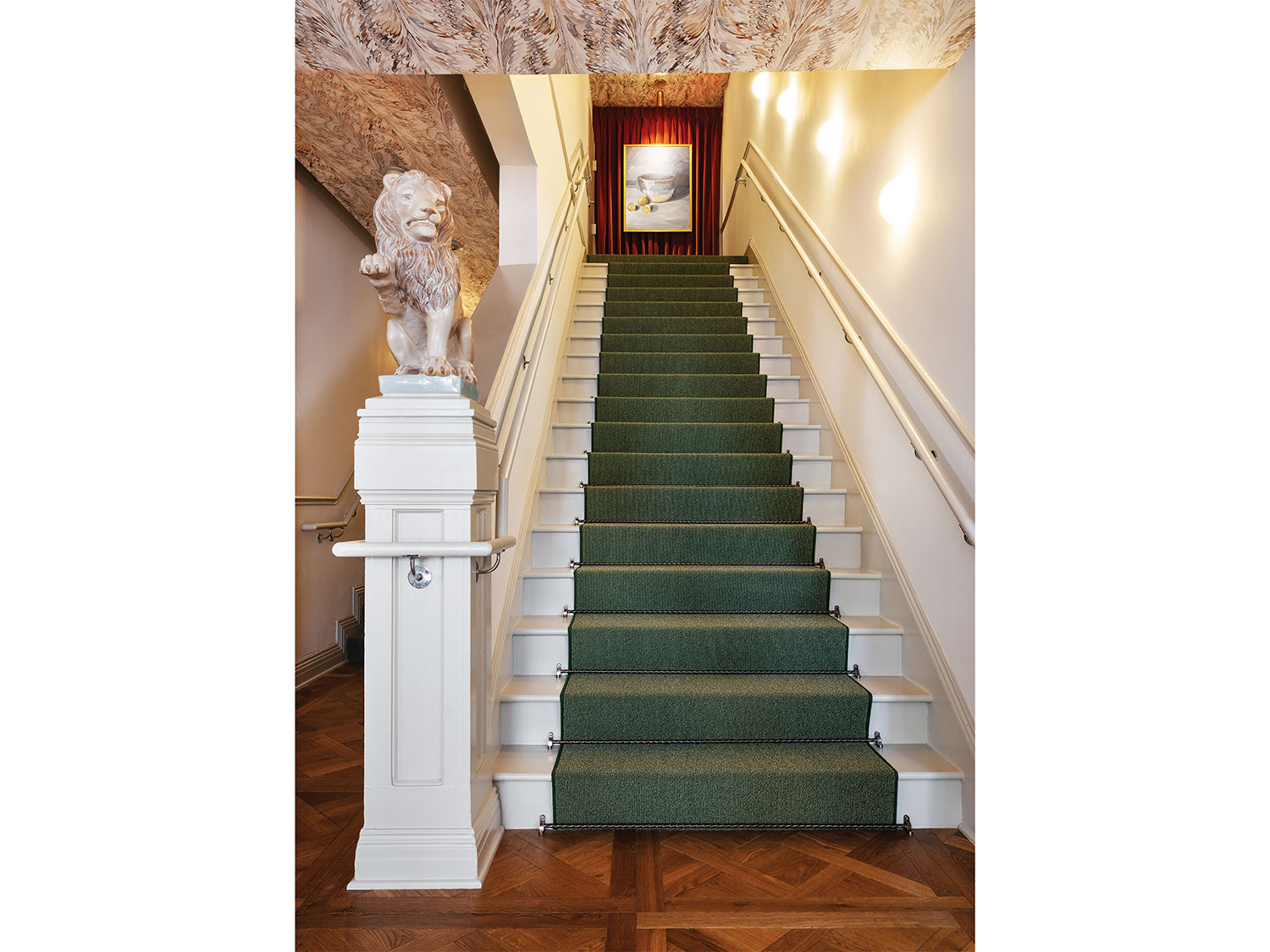 Lobby staircase leading to 2nd floor guest rooms