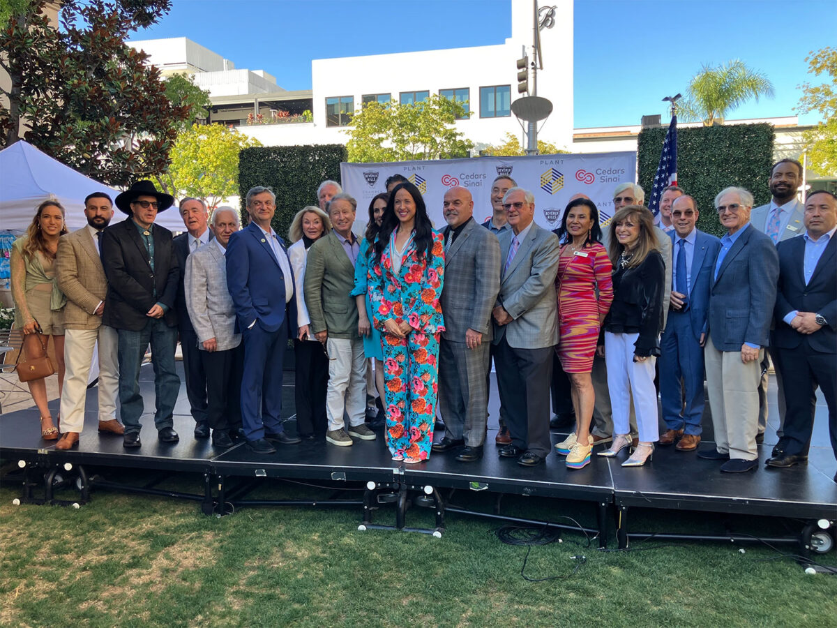 Chamber board inductees with members of the City Council and distinguished guests at the garden party