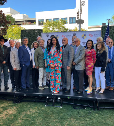 Chamber board inductees with members of the City Council and distinguished guests at the garden party