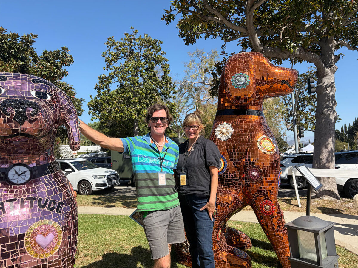 Elizabeth and Duffy Healey with their canine sculptures