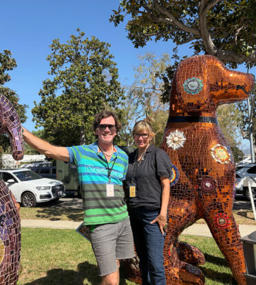 Elizabeth and Duffy Healey with their canine sculptures