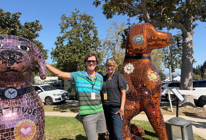 Elizabeth and Duffy Healey with their canine sculptures