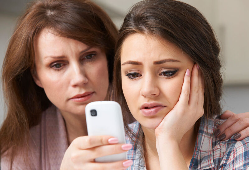 mother comforting daughter being bullied Depositphotos 92754062 XL